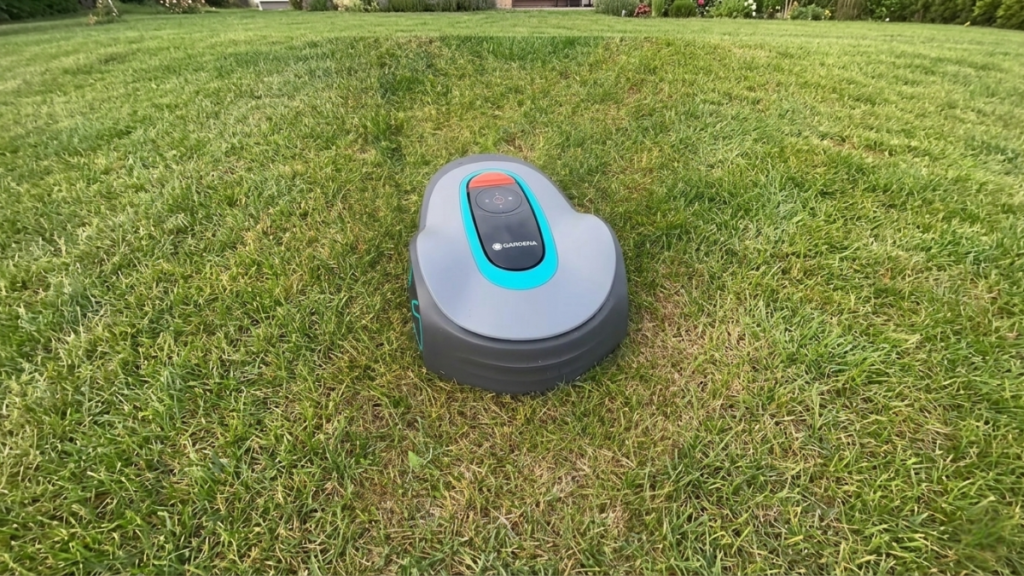 Automatic robotic lawn mower positioned on a residential lawn